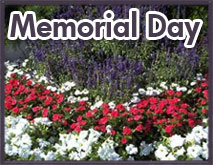 Memorial with red and white flowers